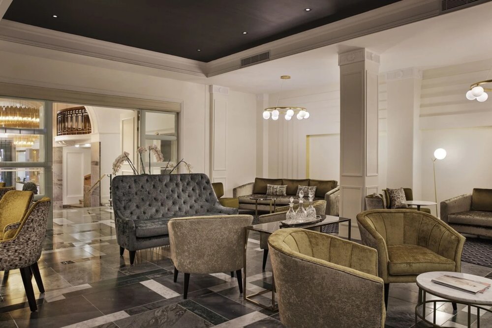 Elegant lounge area inside Fable Auckland MGallery’s historic Art Deco building
