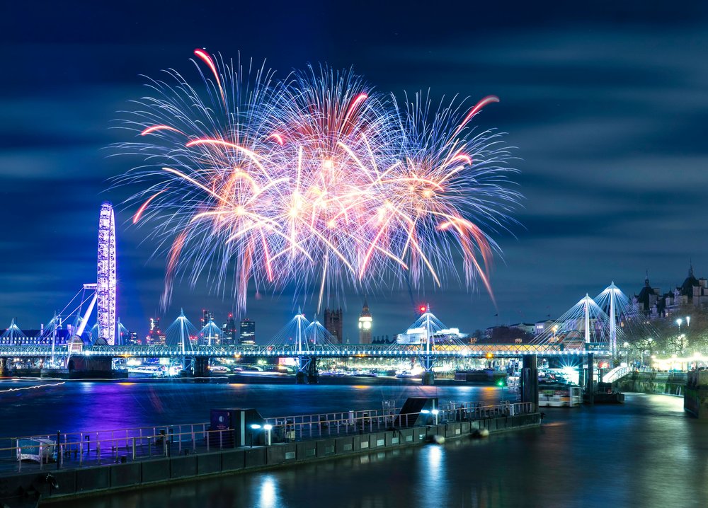 Bright fireworks over the London Eye and Thames during New Year’s Eve celebrations in London