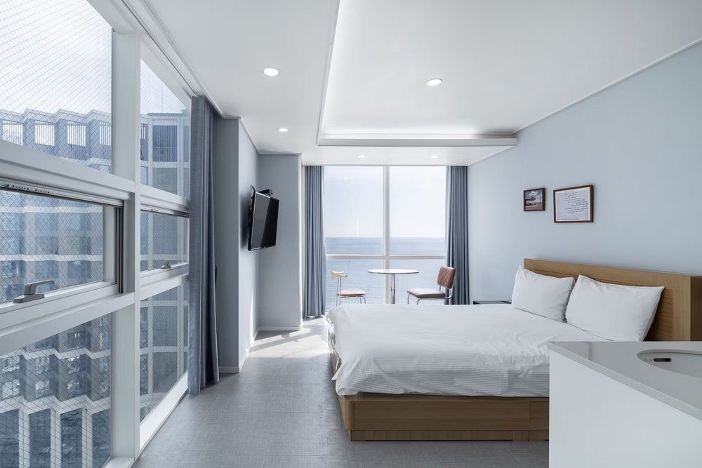 Bright minimalist room at Elysia Boutique Hotel