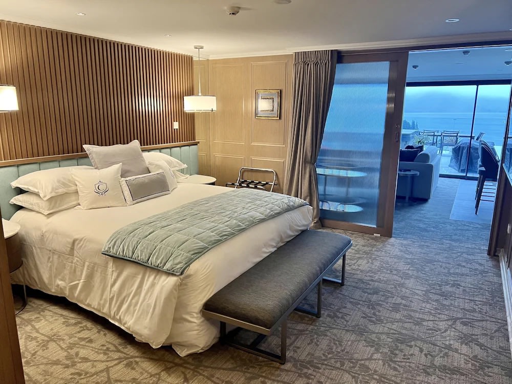 Luxury lakeview suite at The Carlin Boutique Hotel with balcony and mountain scenery