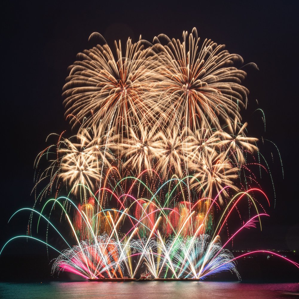 Colorful fireworks display lighting up the night sky in Okinawa