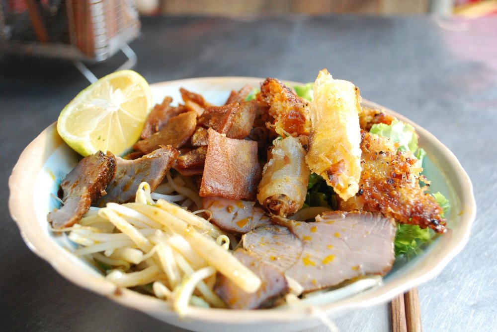 Cao Lầu with spring rolls | Photo Credits: Alpha on Flickr