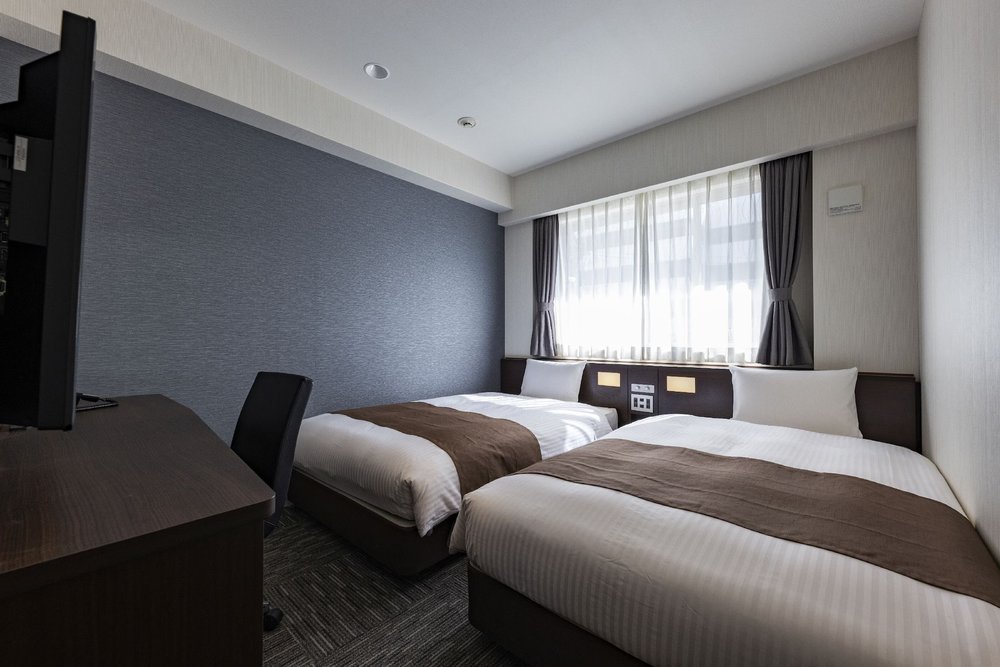 Twin room at KOKO Hotel Osaka Shinsekai, an affordable stay near Tsutenkaku Tower