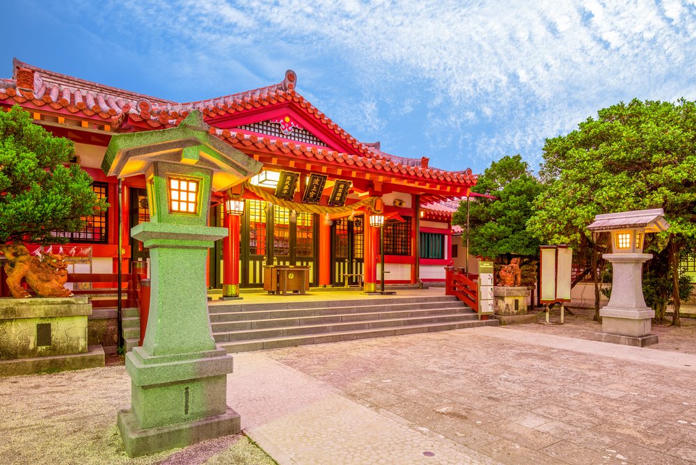 Colorful Shinto shrine in Naha, Okinawa, with traditional red roof design