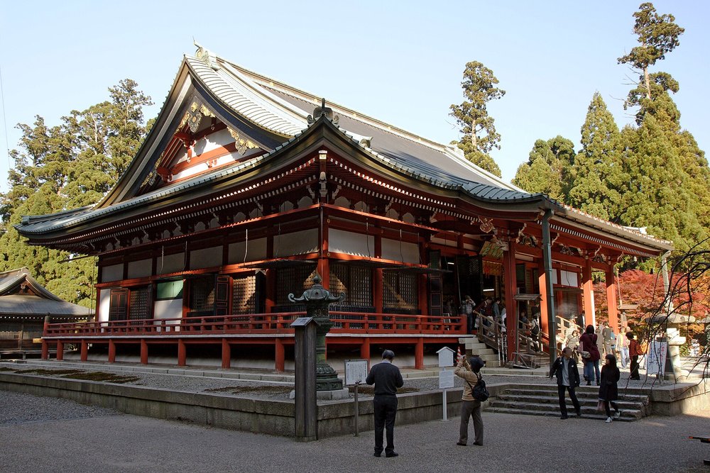 Main temple hall of Enryaku-ji on Mount Hiei surrounded by forest in Kyoto.