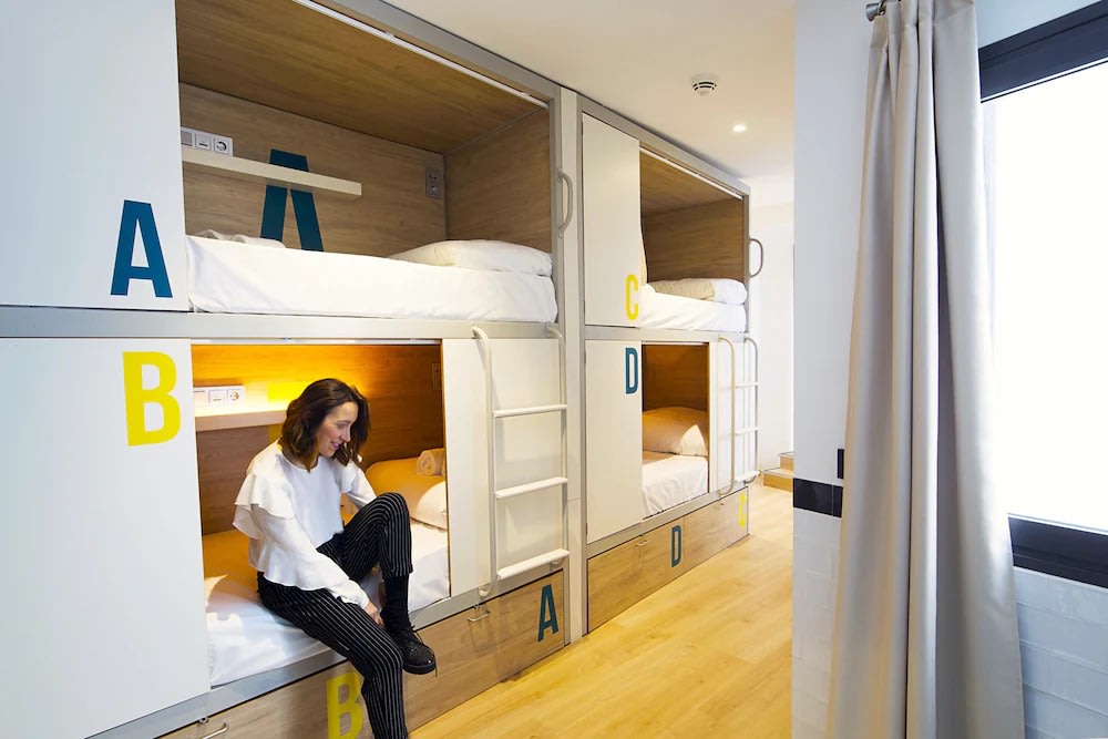 Cozy pod beds at U-Sense For You Hostel Sevilla, a comfortable Seville hostel for travelers