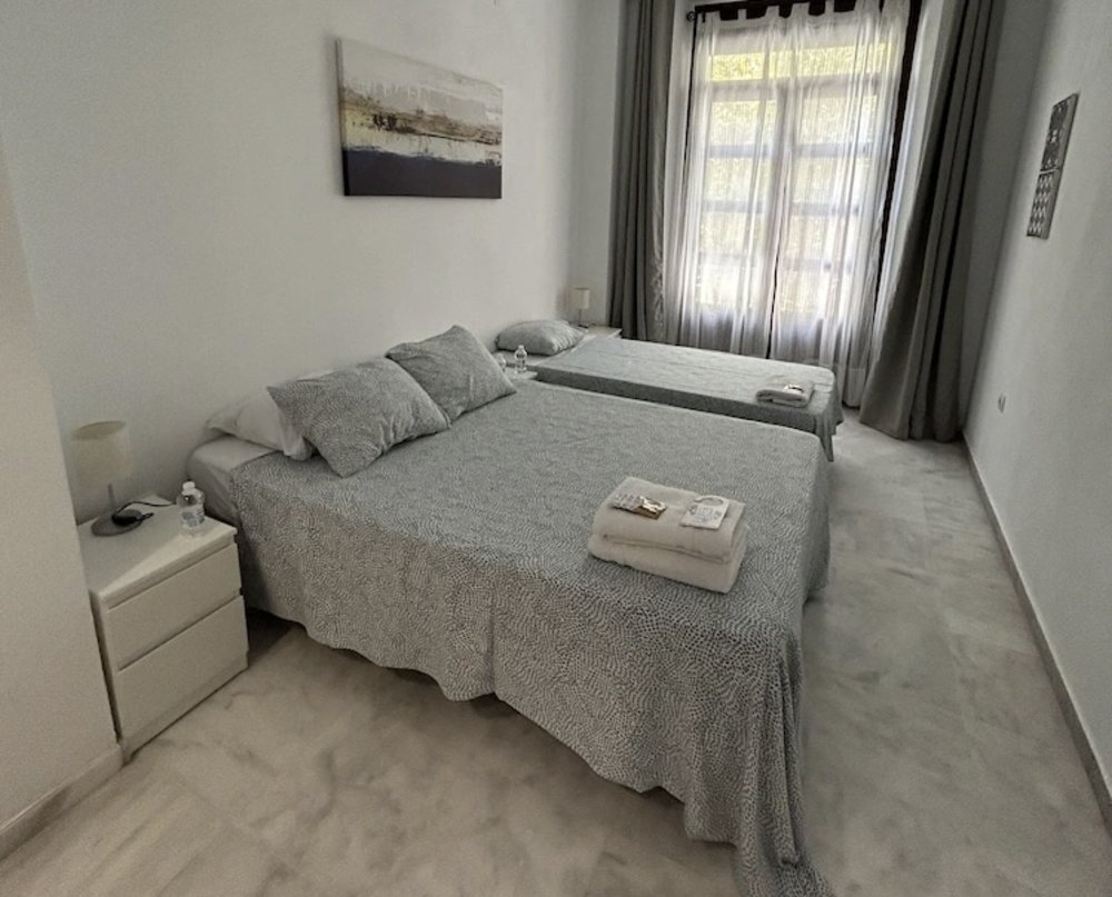 Clean twin room at The Spot Central Hostel, a comfortable Seville hostel in the city center