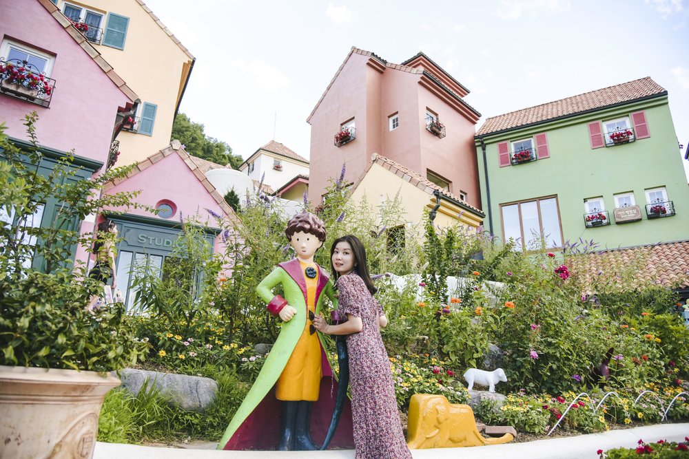 Traveler visiting colorful Petite France village in Gapyeong
