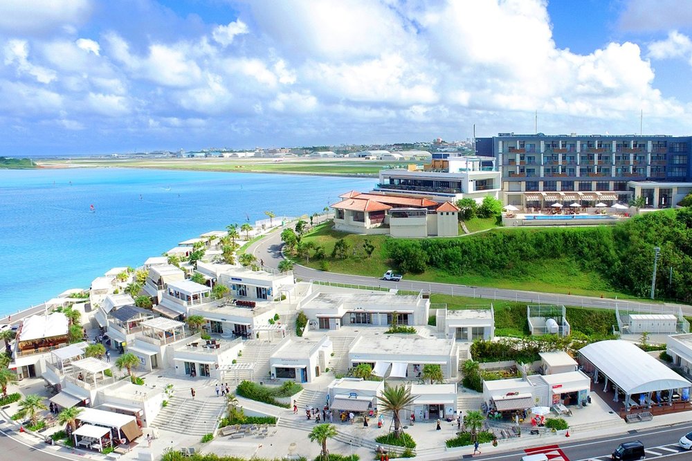 Senaga Island waterfront with white buildings and ocean views in Okinawa