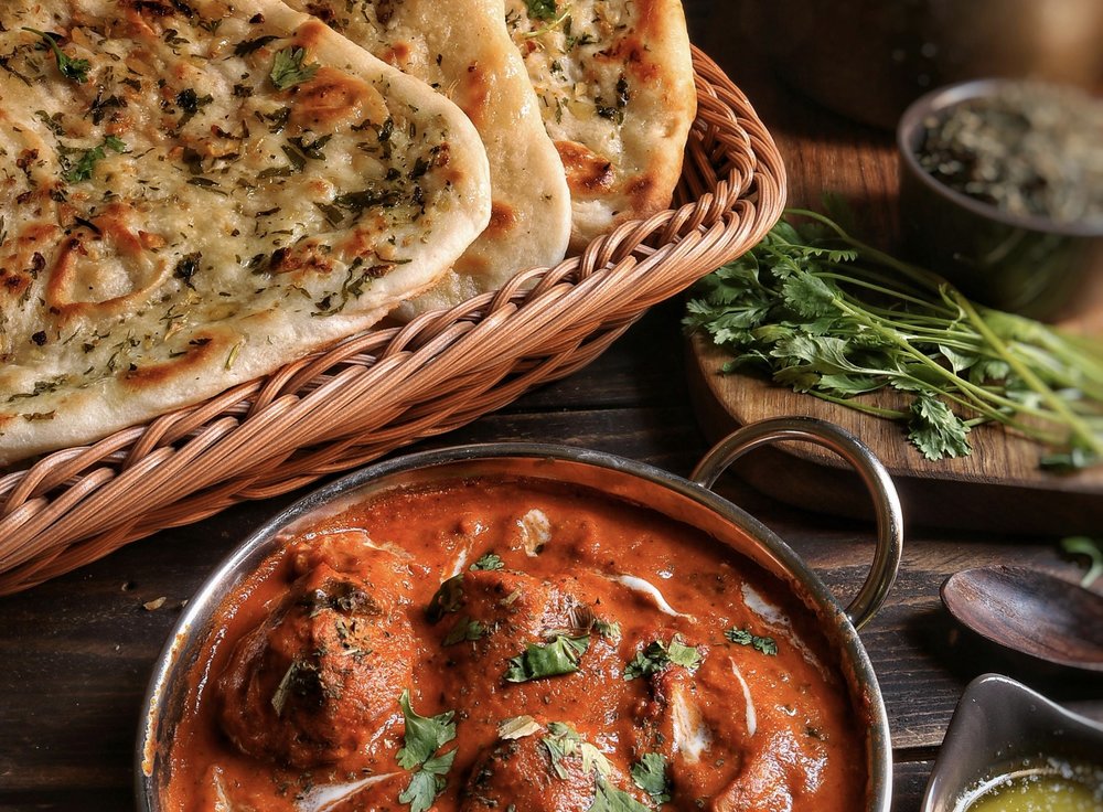 Butter chicken with naan at Hobson Indian Takeaway | Photo from Saveurs Secretes on Pexels