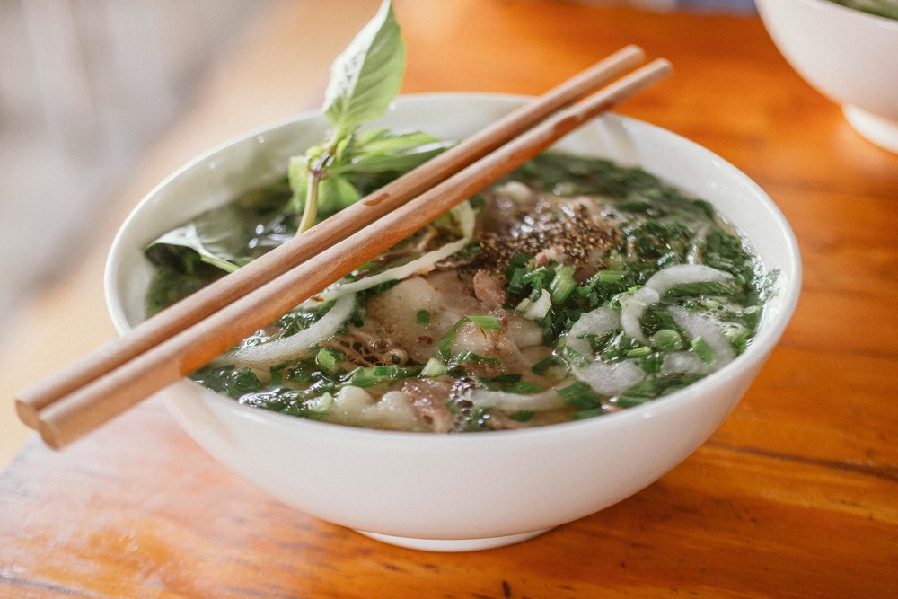 Vietnamese pho with herbs at Try It Out, a favorite cheap eats spot in Auckland | Photo from Nang Phong Bui
