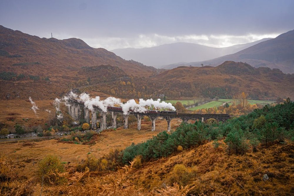 The Jacobite Steam Train in the Scottish Highlands in the fall