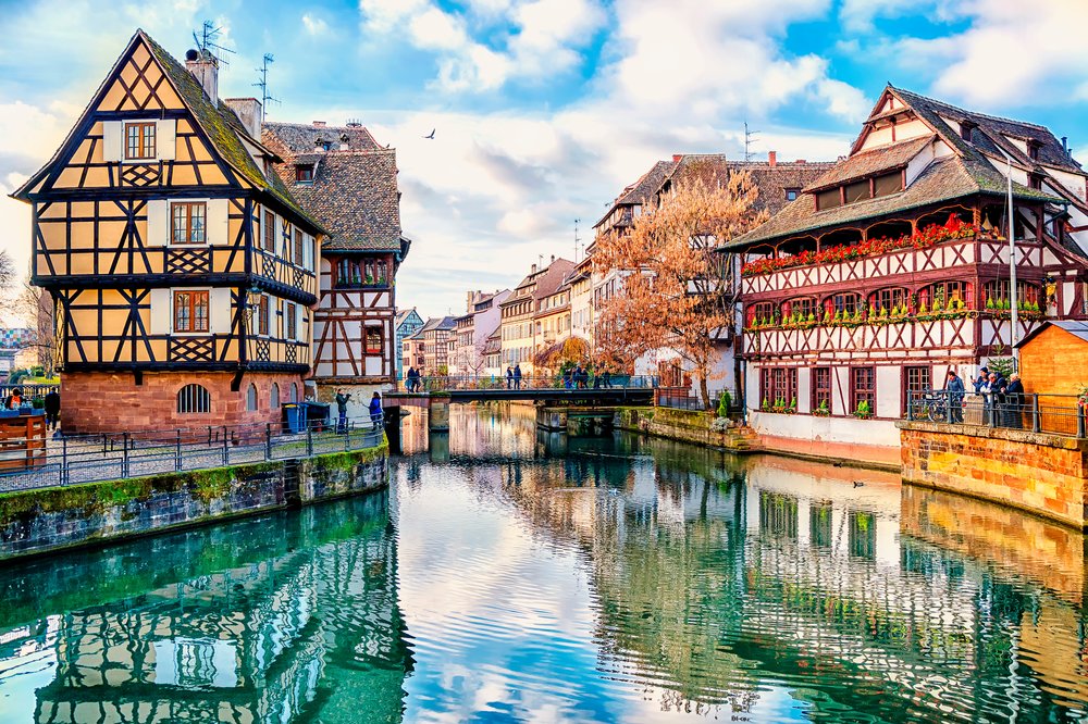 Colorful half-timbered houses and canal in Strasbourg’s Petite France district