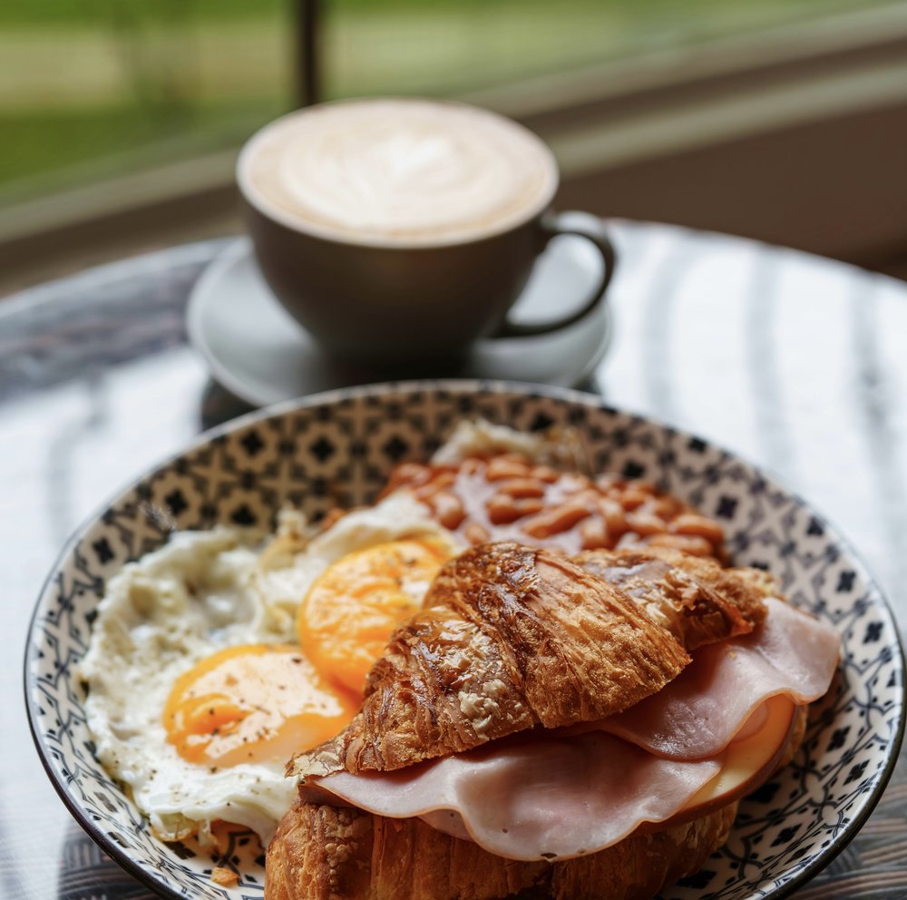 Croissant breakfast with eggs and coffee at Bordeaux café brunch spot | Photo from Richard L on Pexels