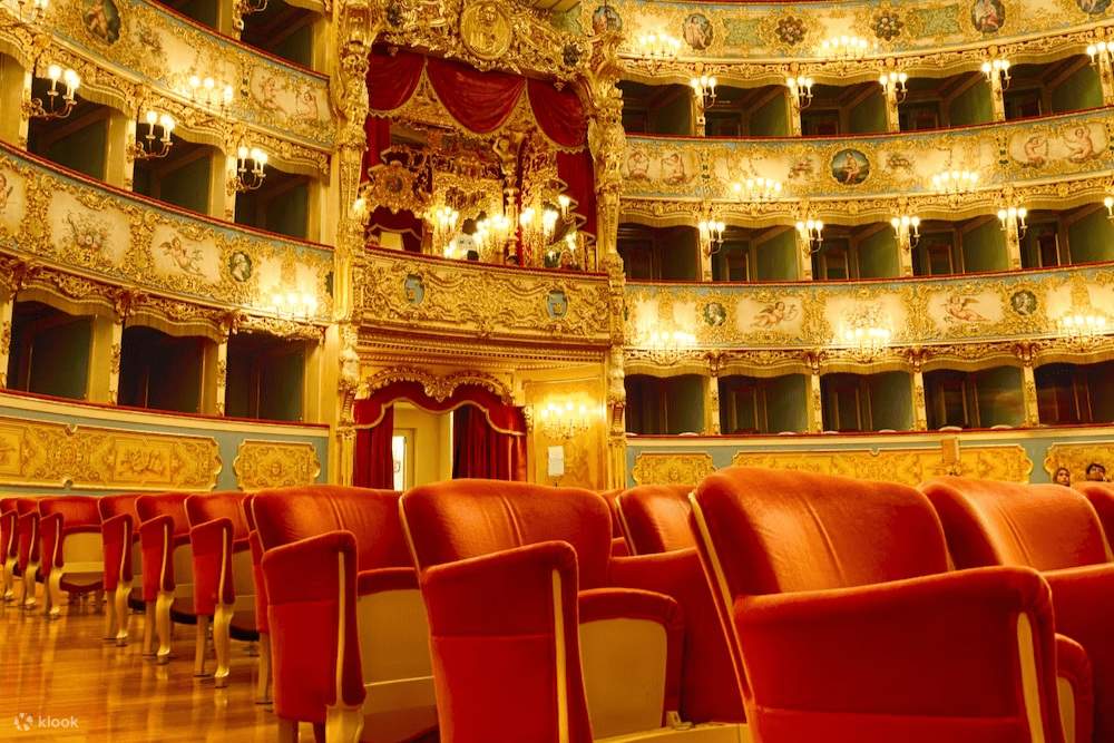 The interior of La Fenice Opera House, with the place lit up by gold lights