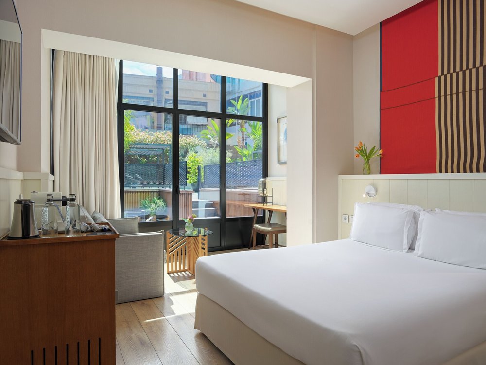 Rooms in H10 Cubik hotel