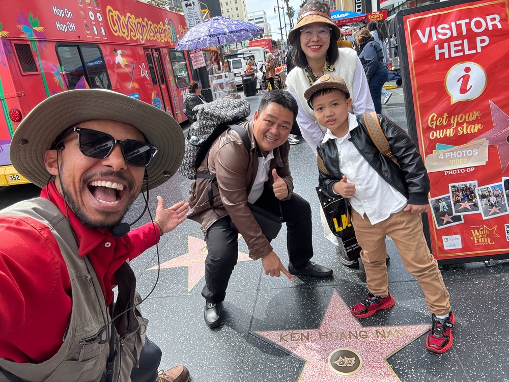 Tourists enjoying Hollywood Walk of Fame star experience in Los Angeles