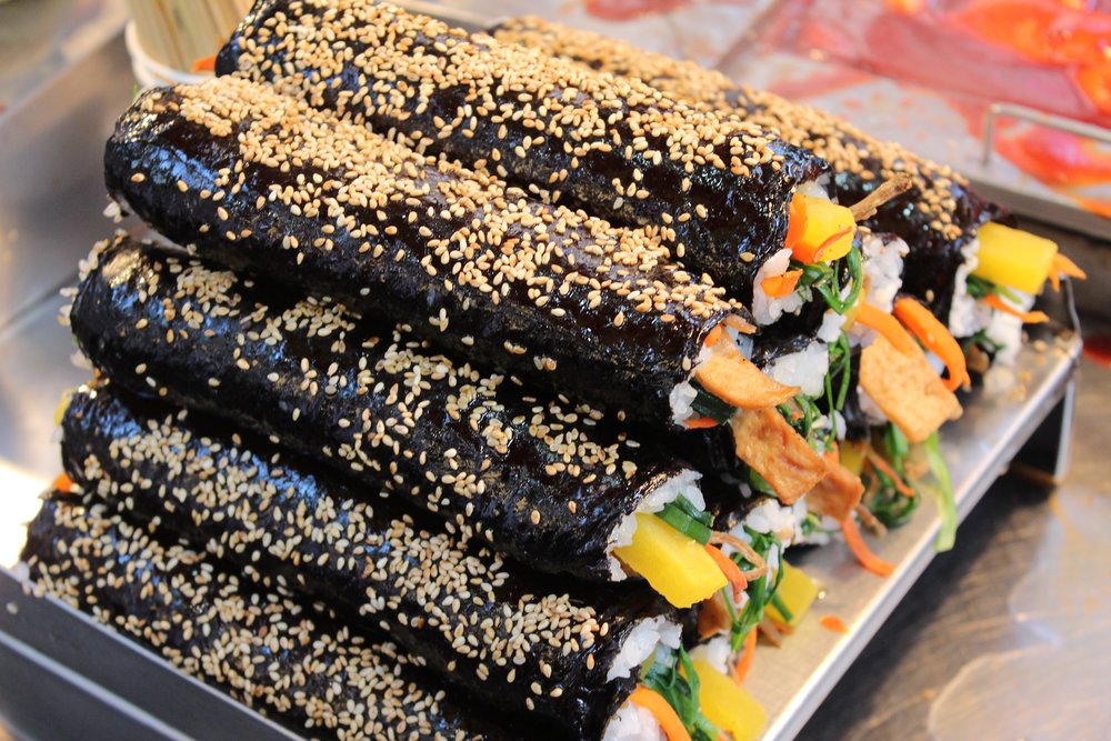 Fresh gimbap rolls with vegetables and sesame