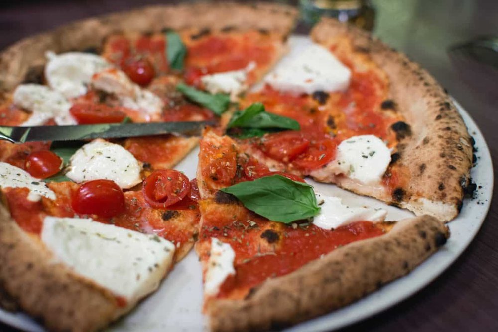 Burrata pizza slice 