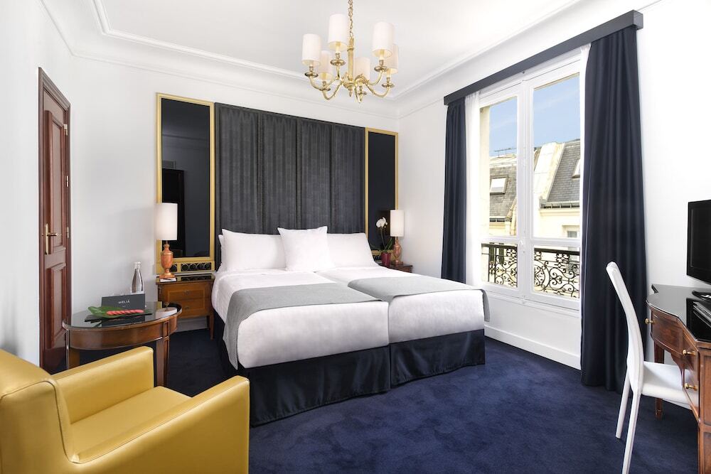 Stylish room at Meliá Paris Champs-Élysées, one of the best hotels in Paris for families