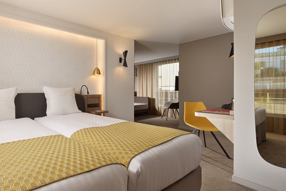 Bright room at Hotel Auteuil Tour Eiffel, a family friendly hotel in Paris, France