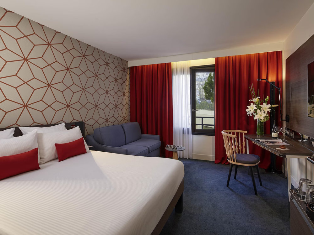 Spacious guest room at Novotel Paris Les Halles, a popular family friendly hotel in Paris