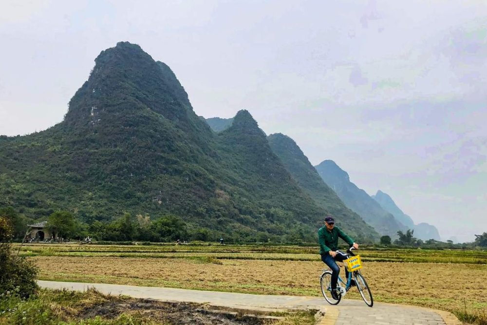 Chiều: Đạp Xe Khám Phá Làng Cổ Cửu Tiên & Sông Yulong