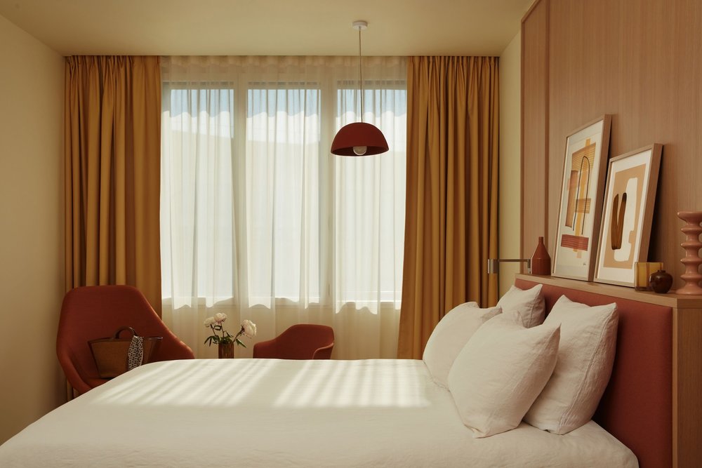 A cozy room at OKKO Hotels Paris Rosa Parks.