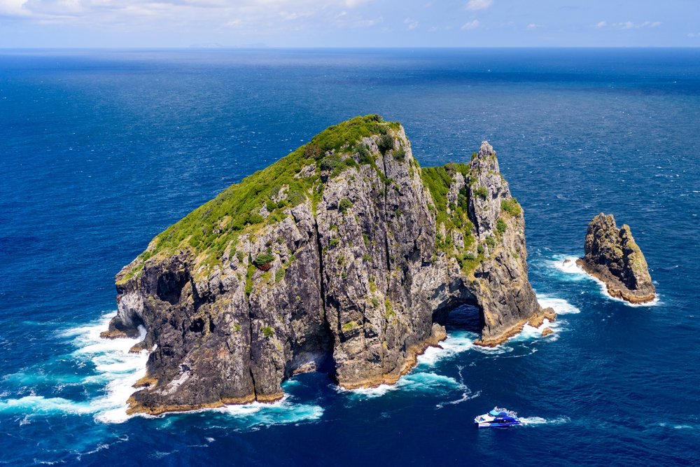 Bay of Islands aerial view showing rocky island and blue ocean waters