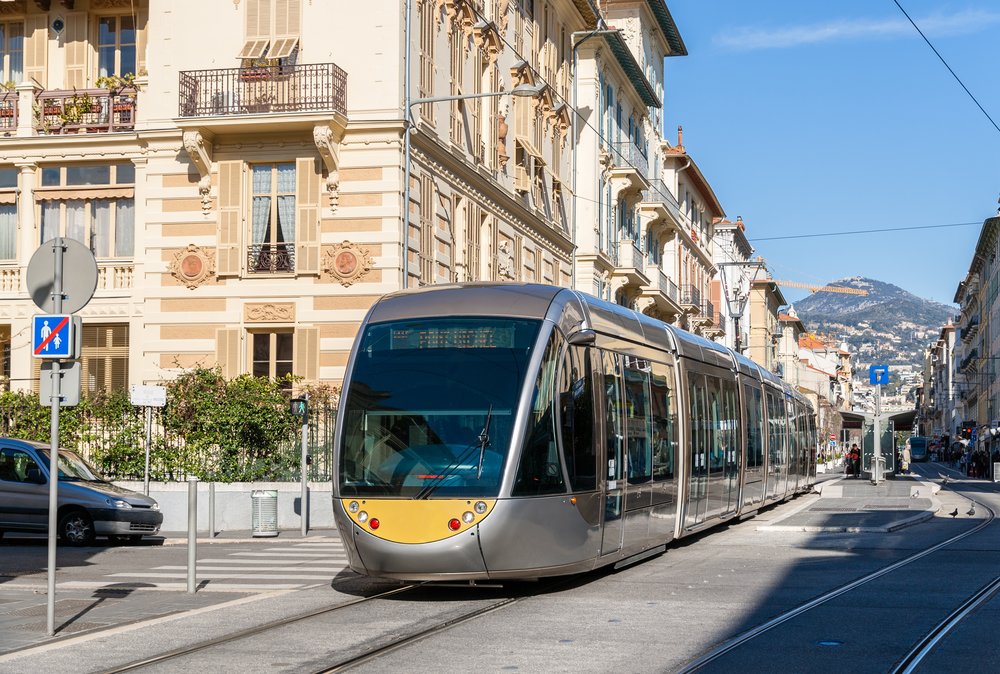 Tram in Nice, French Riviera, passing by beautiful architecture
