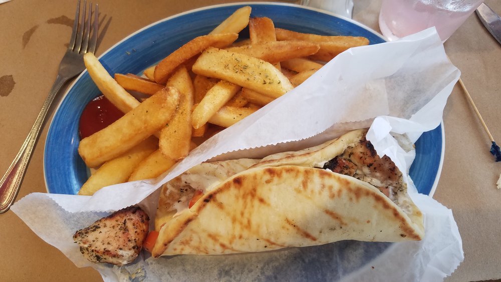 Chicken souvlaki pita wrap with fries | Photo Credit: Wikimedia Commons