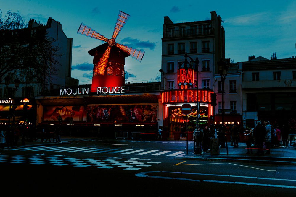 Neon lights of Moulin Rouge at night