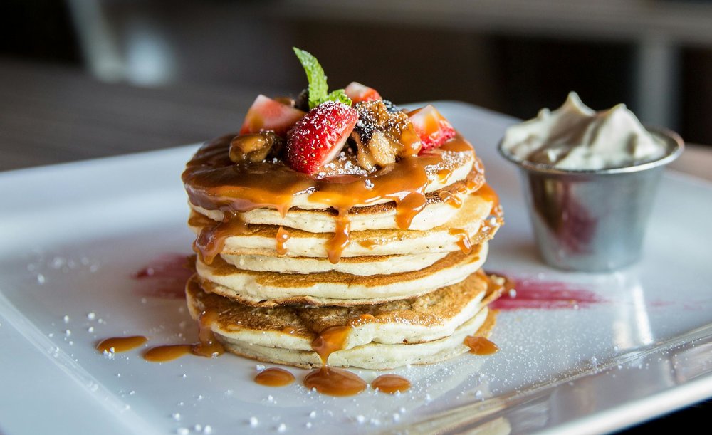 Fluffy pancakes with caramel and fresh strawberries | Photo Credit: Ash Craig on Pexels