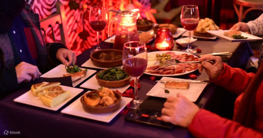 A table spread of tapas and wine
