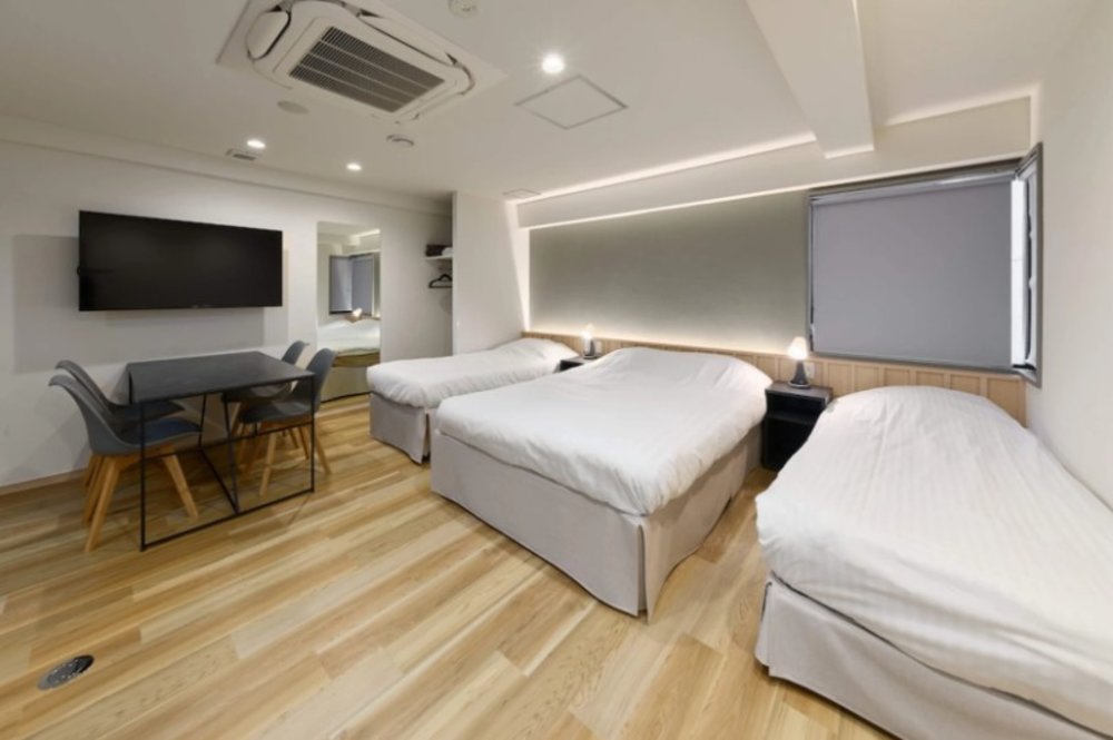 Multiple Beds Room at City Hotel N.U.T.S