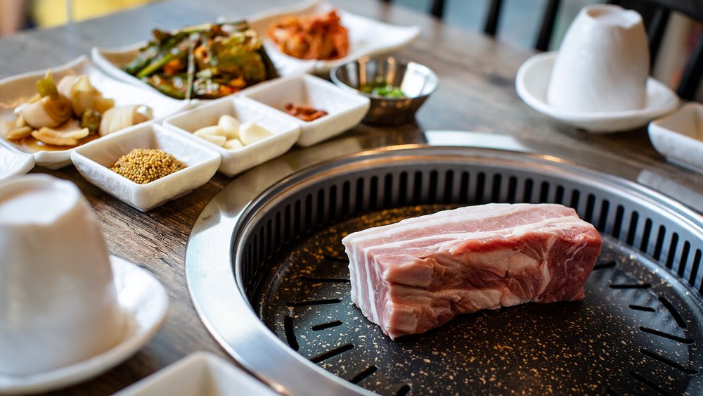 Pork being grilled at 853, a Korean BBQ restaurant in Insadong.
