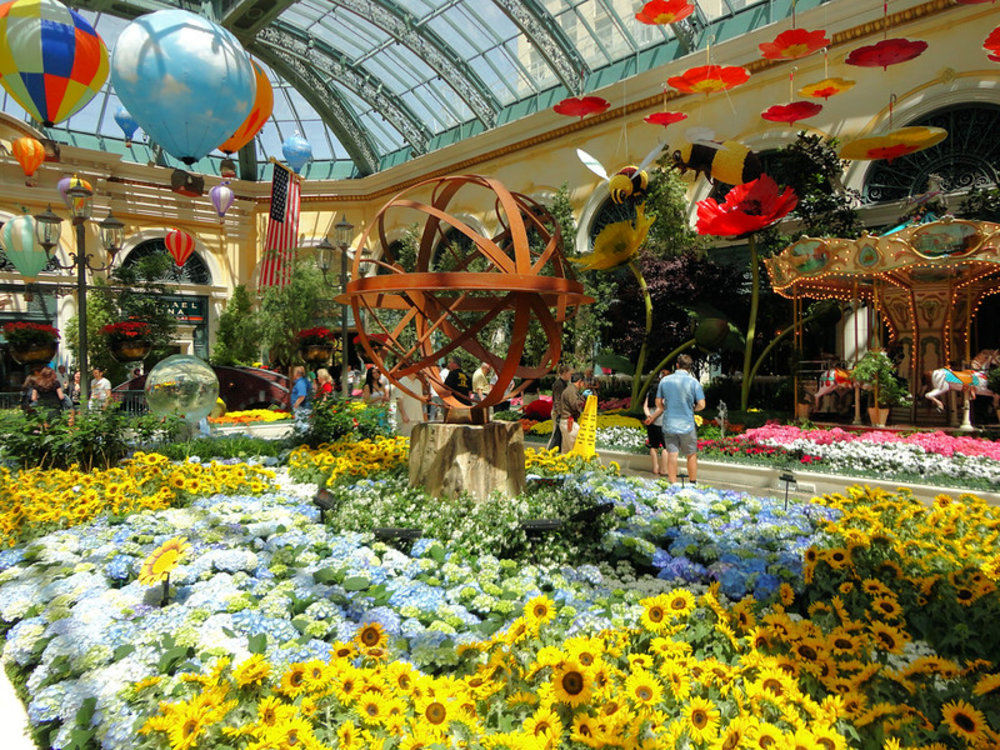 Tourists walking around Bellagio Conservatory
