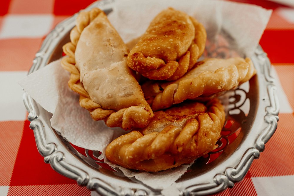 Empanadas served on a plate | Photo credit: Gerry Cejas on Pexels