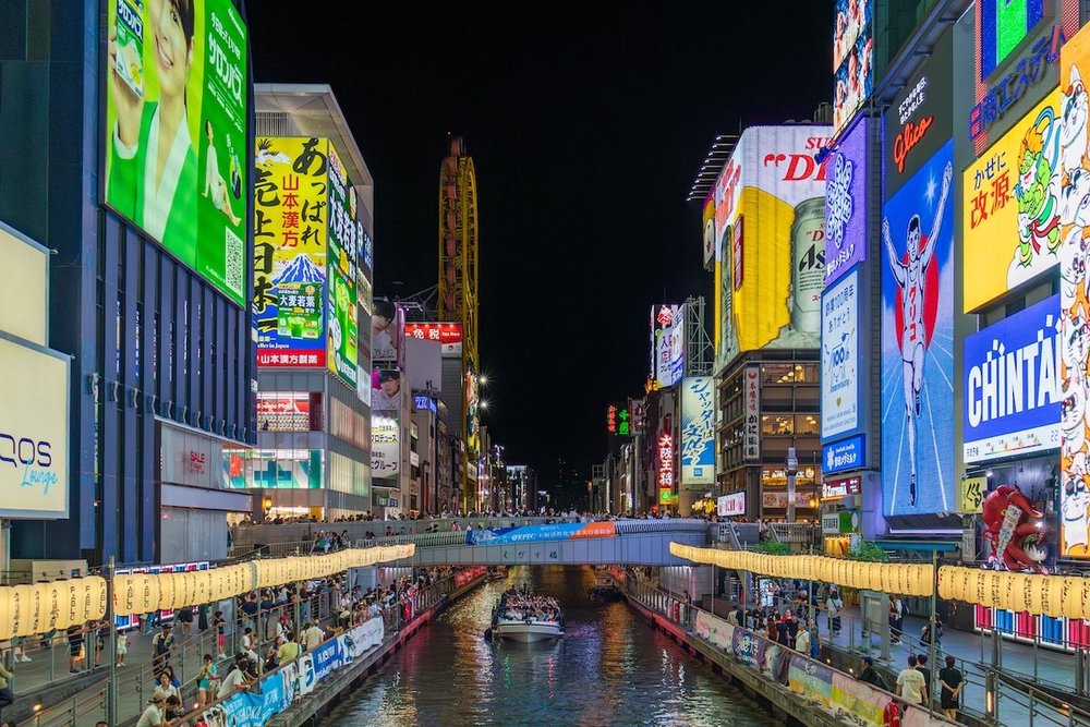 The busy streets of Dotonbori at night.