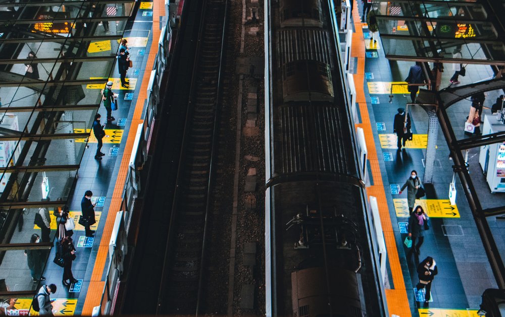 Passengers waiting for the trains inside Osaka Station.