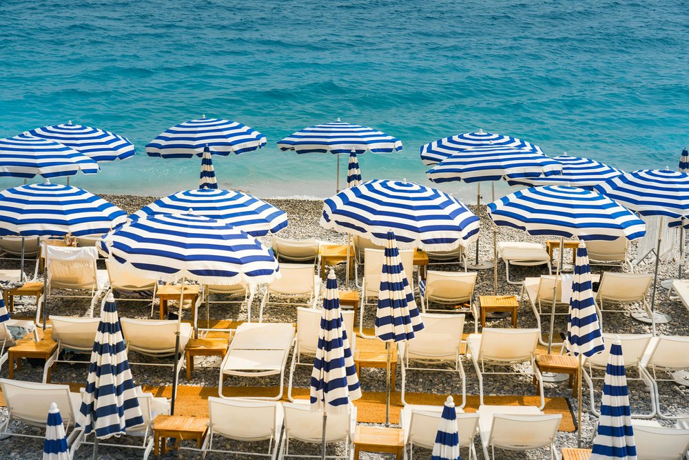 Beach umbrellas in French Riviera | Photo Credit: Jakub Zerdzicki on Pexels