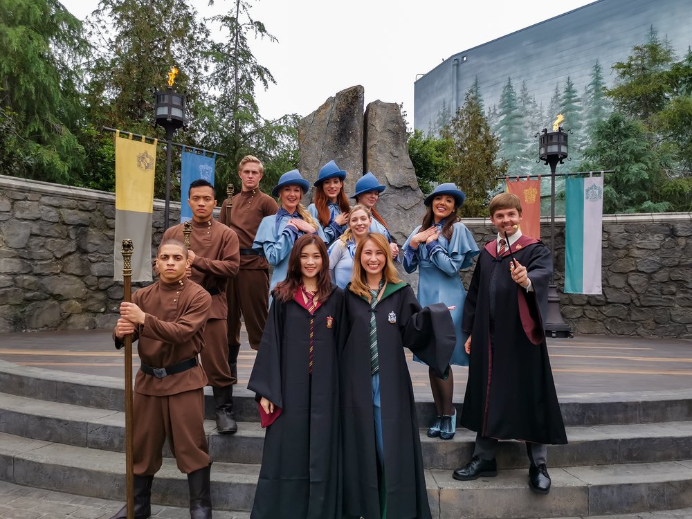 People dressed in Harry Potter costumes