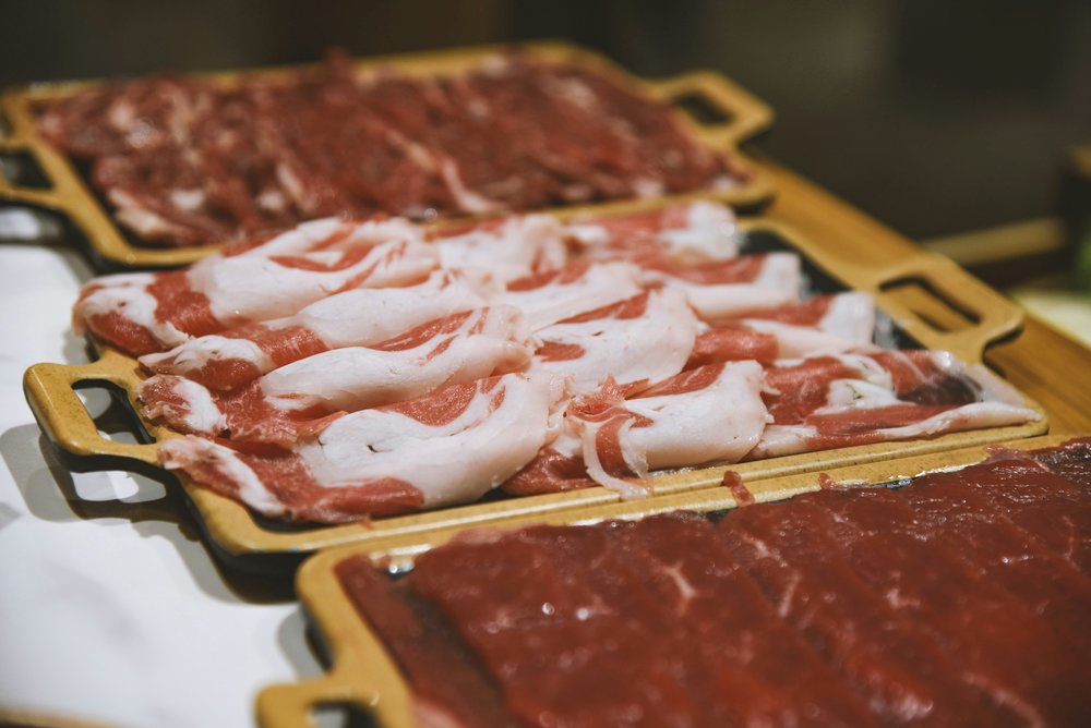 Slices of Jamón Ibérico de Bellota | Photo Credit: Luna Wang on Unsplash
