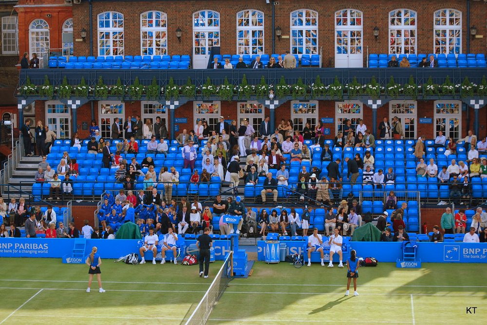 Spectators watching a tennis match at the Queen’s Club Championships in London | Photo Credit: Flickr