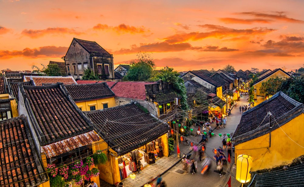 The ancient town of Hoi An at night, glowing beautifully with hundreds of colourful silk lanterns.