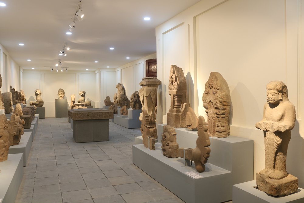 Stone Cham sculptures and artifacts displayed inside the Da Nang Museum of Cham Sculpture