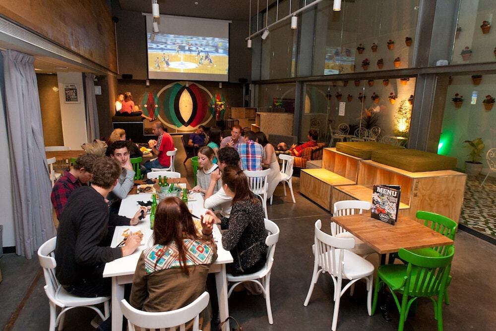 On-site bar where tourists come together in St Christopher's Inn Barcelona