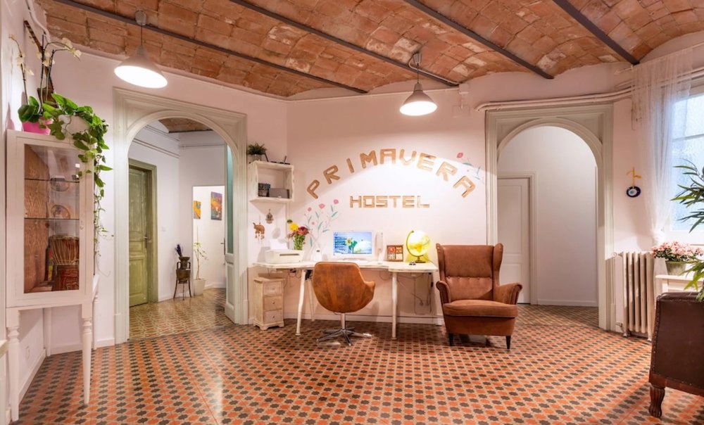Stylish lobby area of Primavera Hostel