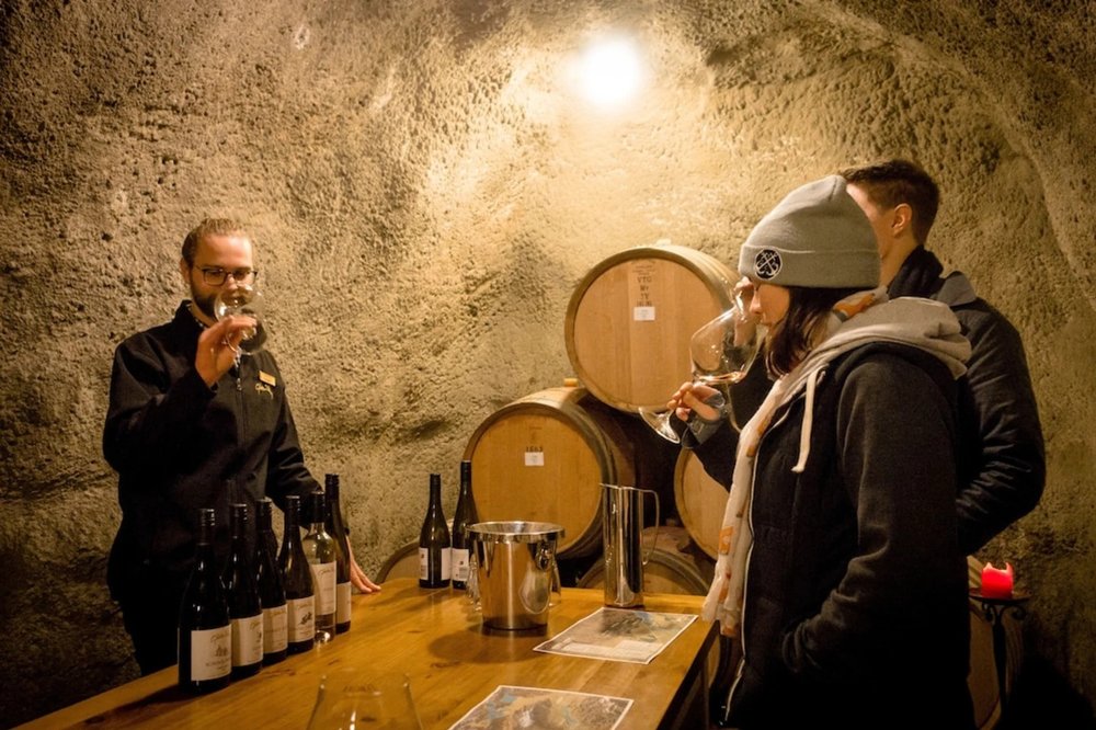 Trying out wine in a Gibbston Valley winery tour