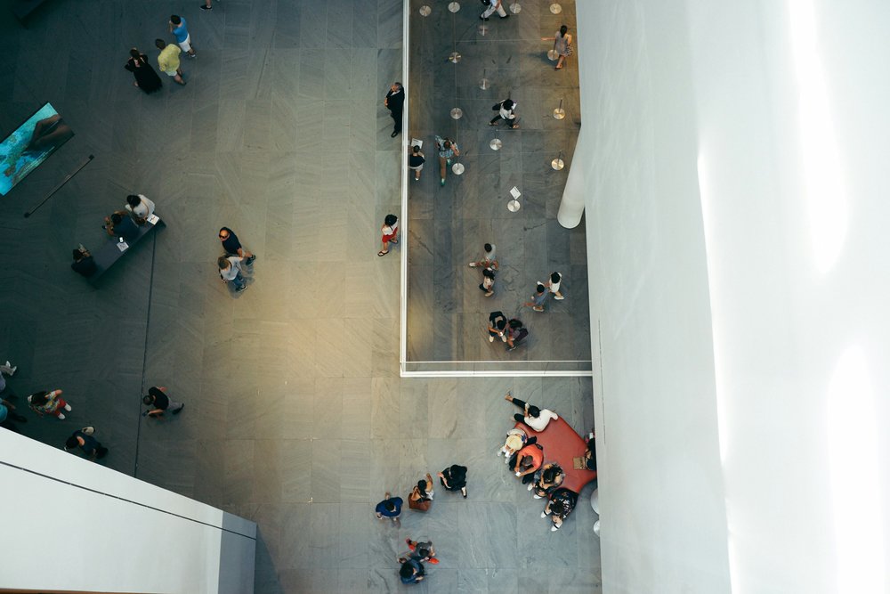 People walking around MoMA